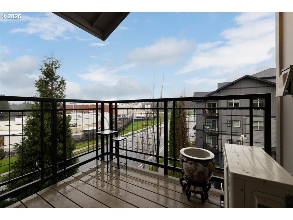 13895 Southwest Meridian Street, Unit 412 Beaverton, OR 97005 - Photo 16 of 38 a view of balcony with furniture