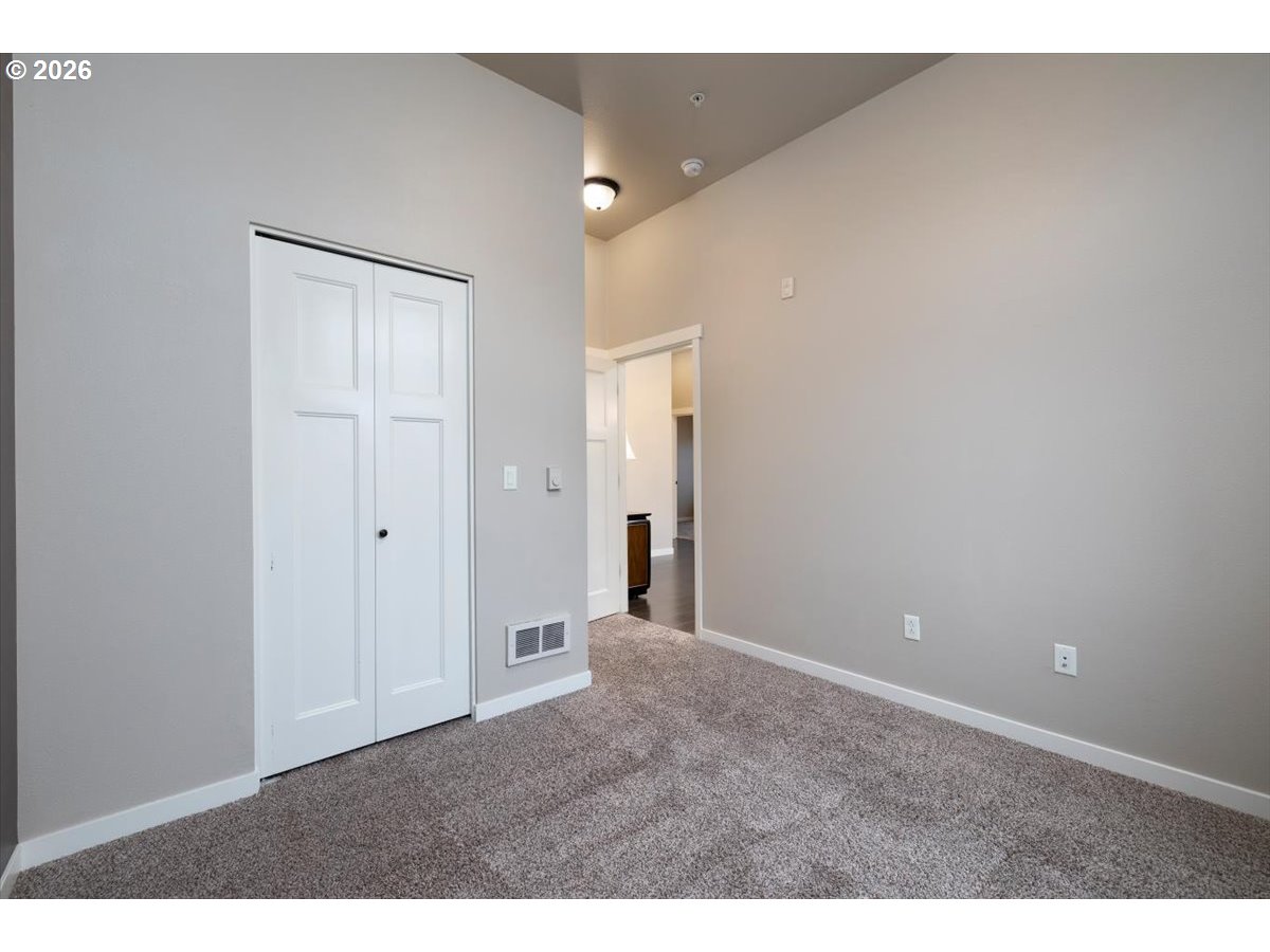 13895 Southwest Meridian Street, Unit 412 Beaverton, OR 97005 - Photo 18 of 38 a view of an empty room