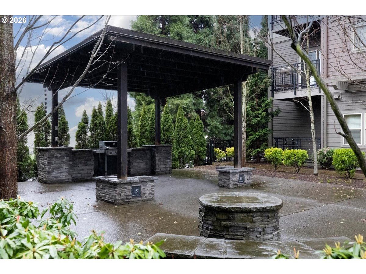 13895 Southwest Meridian Street, Unit 412 Beaverton, OR 97005 - Photo 5 of 38 a view of a chair and table in the patio