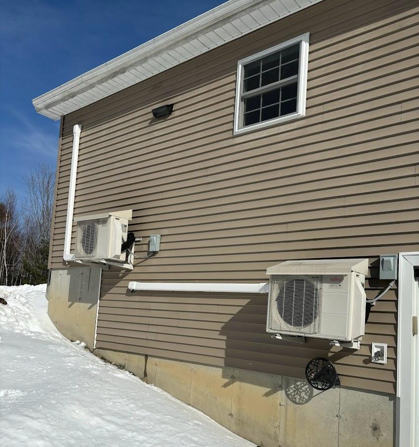 996 Medford Center Road Medford, ME 04463 - Photo 14 of 24 House Outside Heat Pumps
