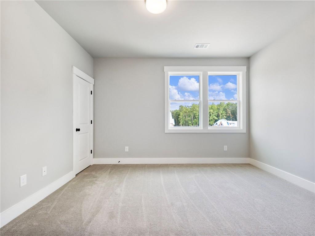 170 Ewing Way Dacula, GA 30019 - Photo 35 of 45 an empty room with a window