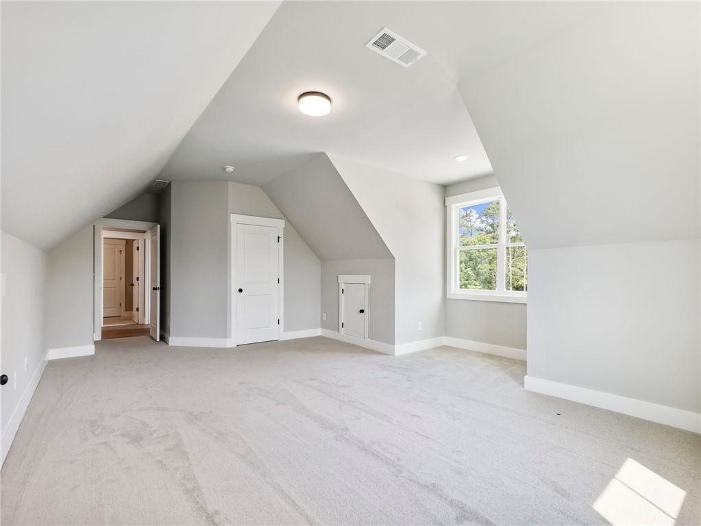 170 Ewing Way Dacula, GA 30019 - Photo 39 of 45 an empty room with windows and closet