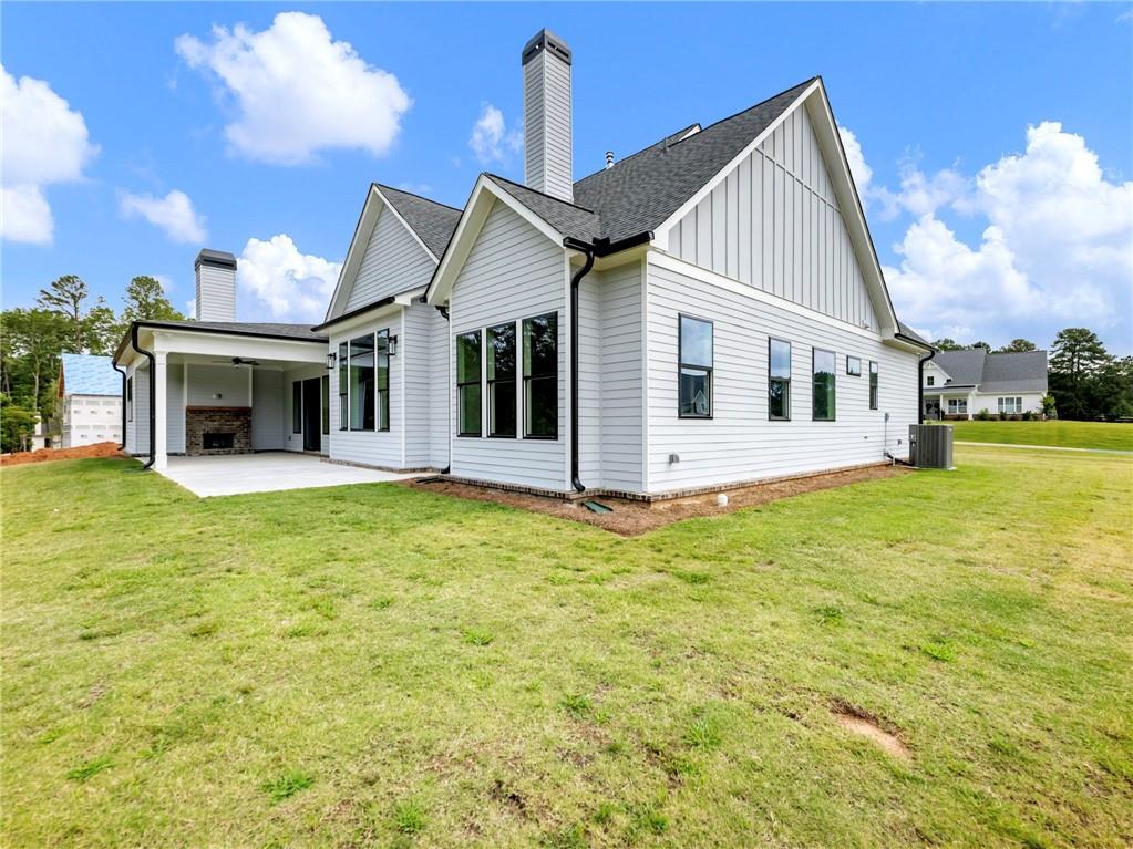 170 Ewing Way Dacula, GA 30019 - Photo 44 of 45 a view of a house with a backyard