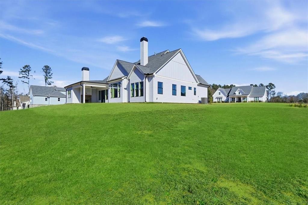 170 Ewing Way Dacula, GA 30019 - Photo 63 of 67 a front view of a house with a yard
