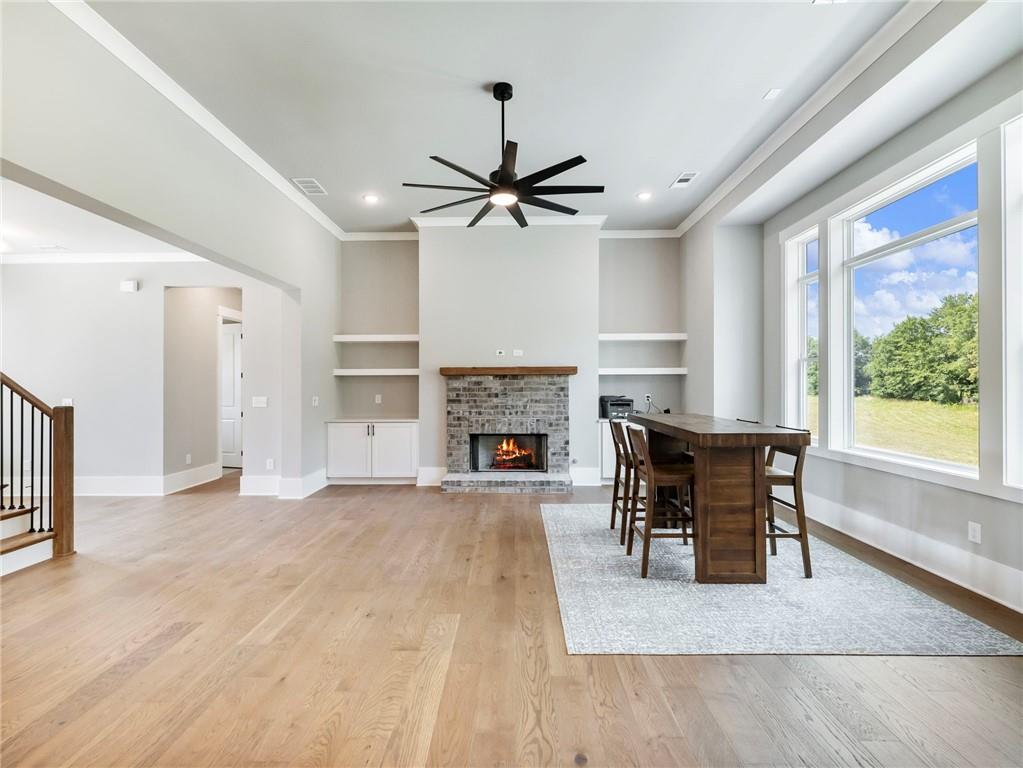 170 Ewing Way Dacula, GA 30019 - Photo 7 of 45 a living room with furniture and a fireplace