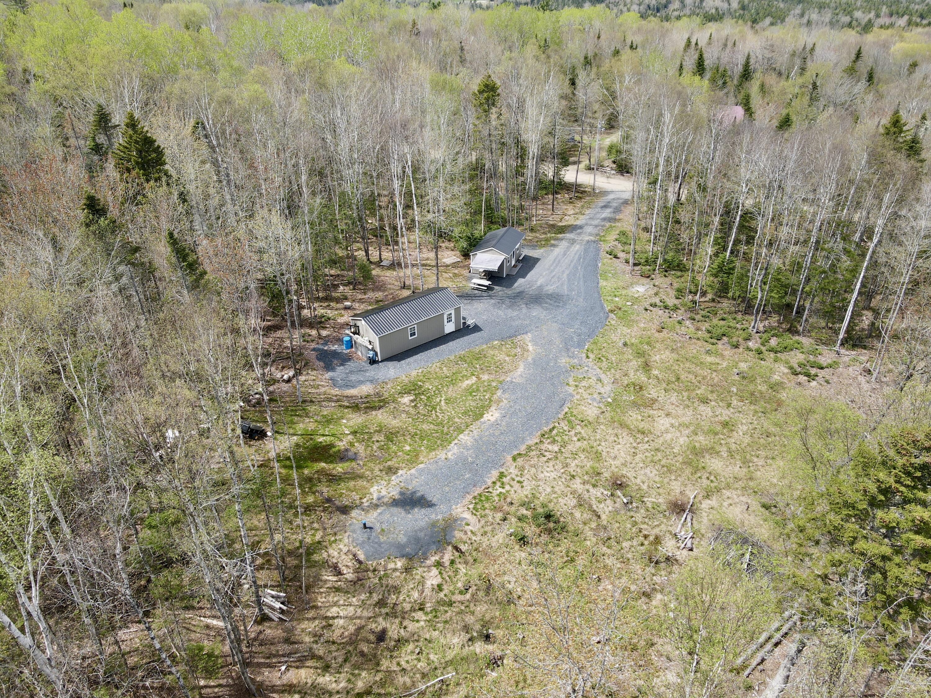 73 Oak Ridge Road Shirley, ME 04485 - Photo 3 of 28 dji_fly_20250515_140418_457_174733227121