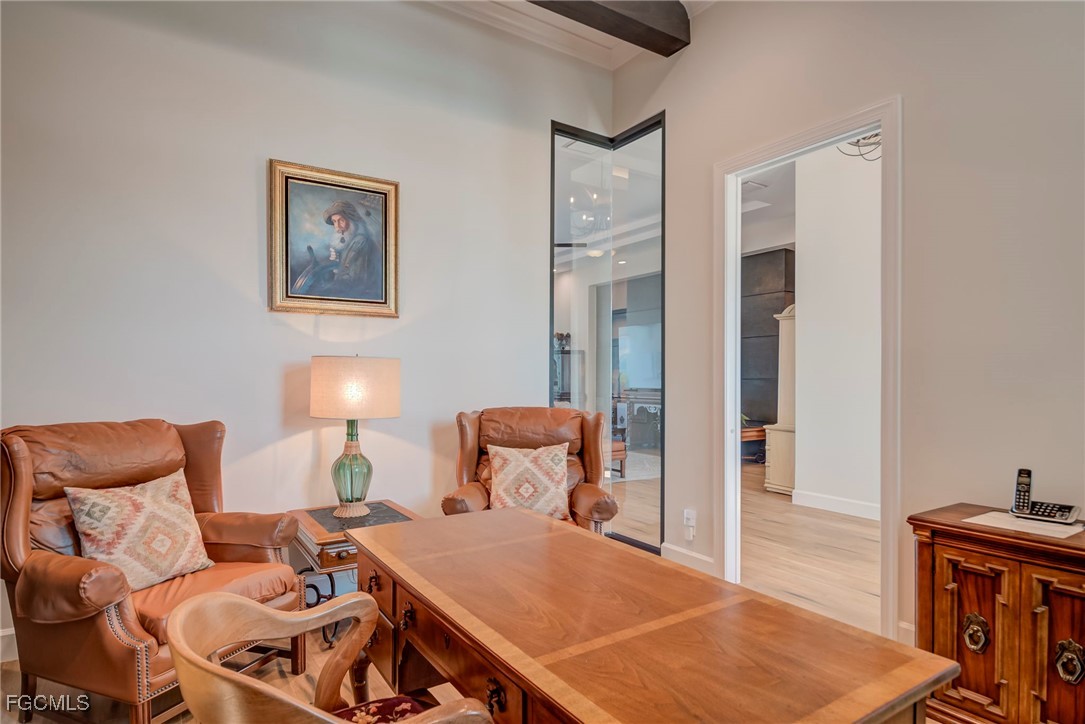 43362 Waterside Trail Punta Gorda, FL 33982 - Photo 15 of 50 a bedroom with a bed and wooden floor