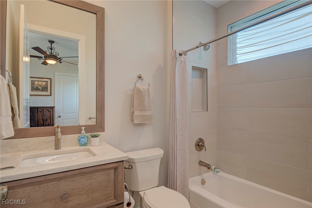 43362 Waterside Trail Punta Gorda, FL 33982 - Photo 29 of 50 a bathroom with a sink a toilet and shower