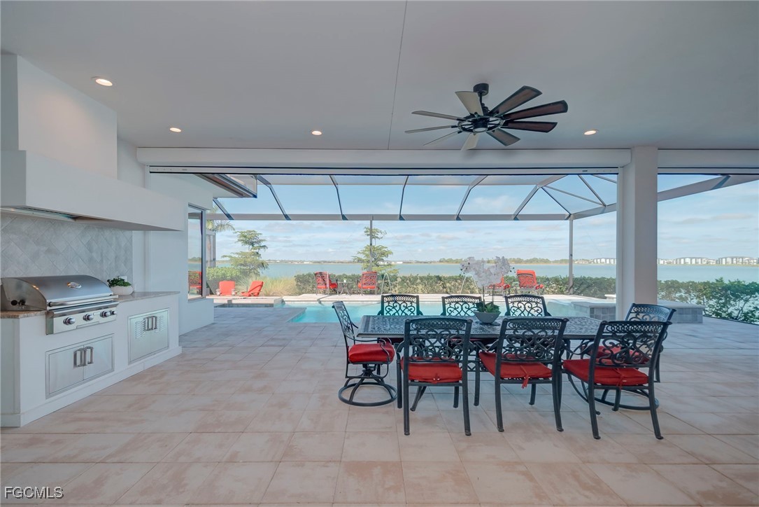 43362 Waterside Trail Punta Gorda, FL 33982 - Photo 33 of 50 a kitchen with stainless steel appliances granite countertop a sink and cabinets