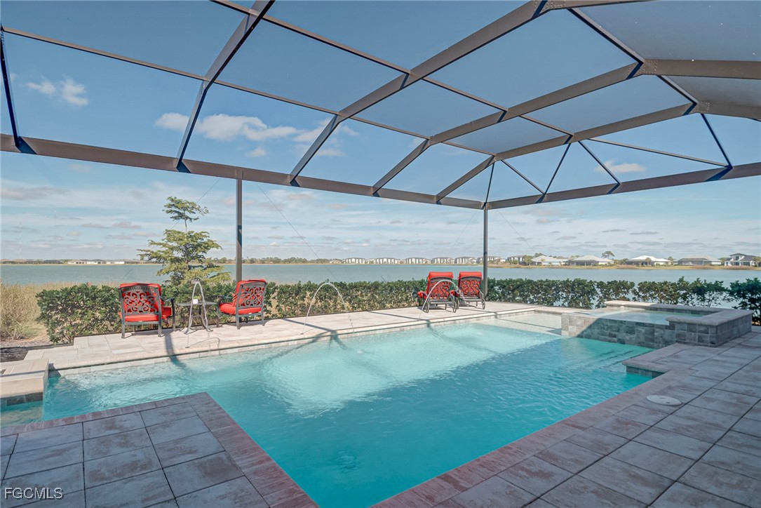 43362 Waterside Trail Punta Gorda, FL 33982 - Photo 37 of 50 a outdoor space with a table and chairs