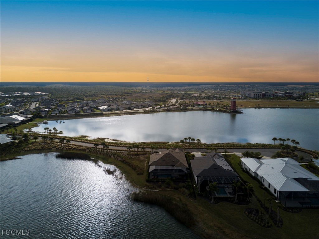43362 Waterside Trail Punta Gorda, FL 33982 - Photo 43 of 50 a view of a lake with a city