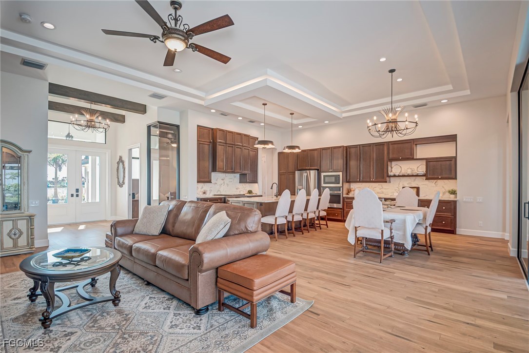 43362 Waterside Trail Punta Gorda, FL 33982 - Photo 7 of 50 a living room with furniture and a large window