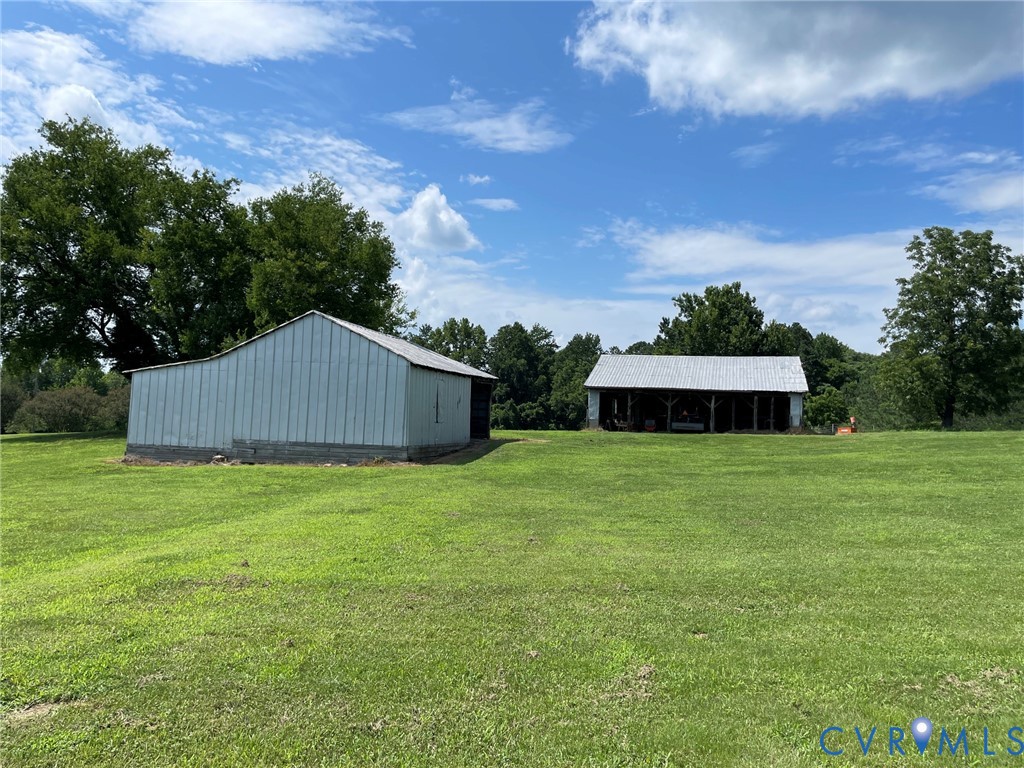 1 Deer Run Road Blackstone, VA 23824 - Photo 3 of 17 Expansive green space featuring two outbuildings w