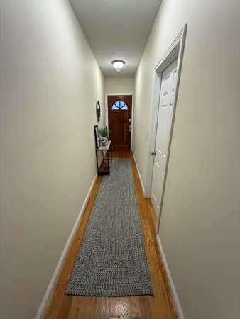 a view of hallway with stairs