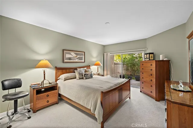 a bathroom with double vanity sinks and a mirror