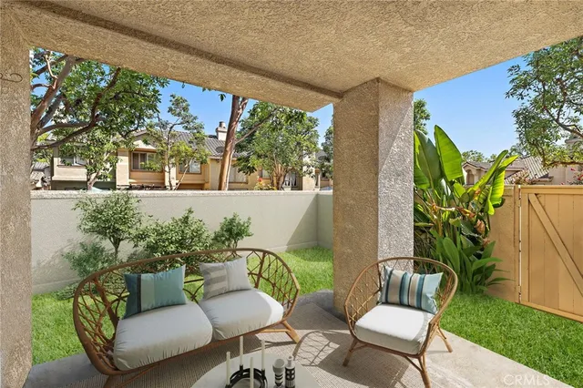 a bathroom with double vanity sinks and a mirror