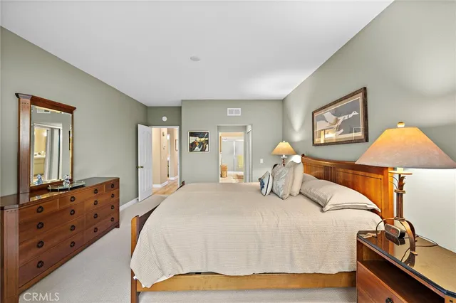 a livingroom with workspace couch and a window