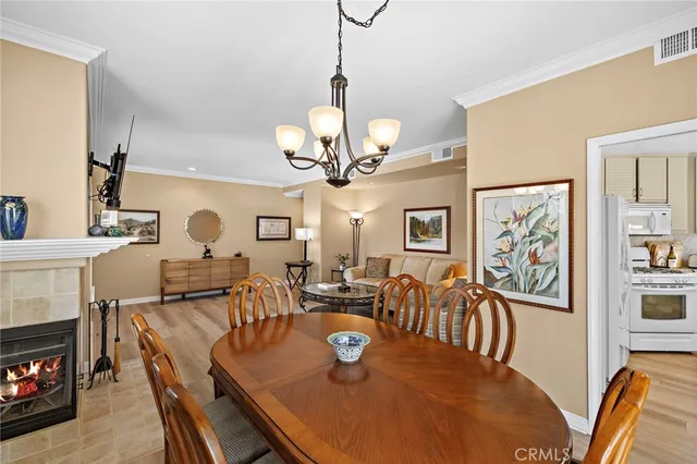 a kitchen with a white cabinets and white appliances
