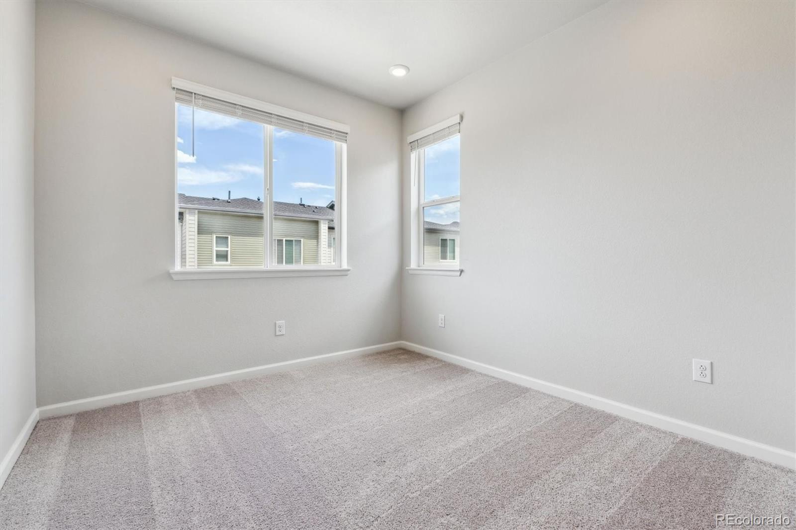465 Interlocken Boulevard, Unit 101 Broomfield, CO 80021 - Photo 15 of 17 an empty room with a window