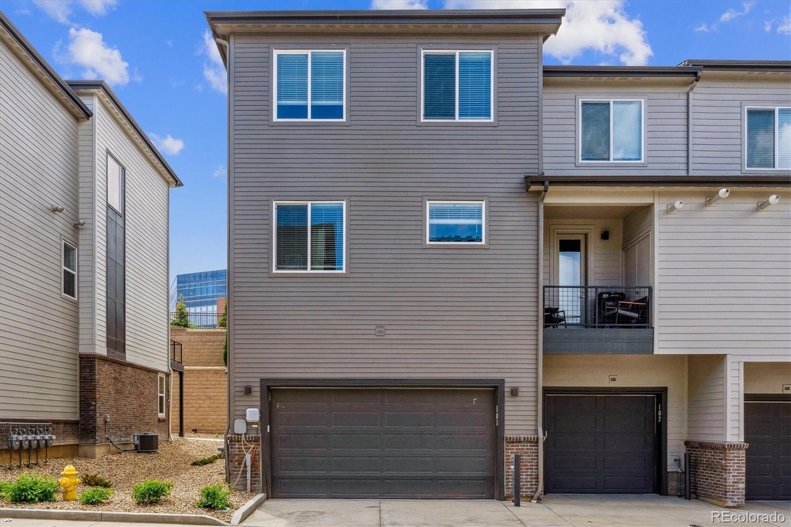 465 Interlocken Boulevard, Unit 101 Broomfield, CO 80021 - Photo 17 of 17 a front view of a house with many windows