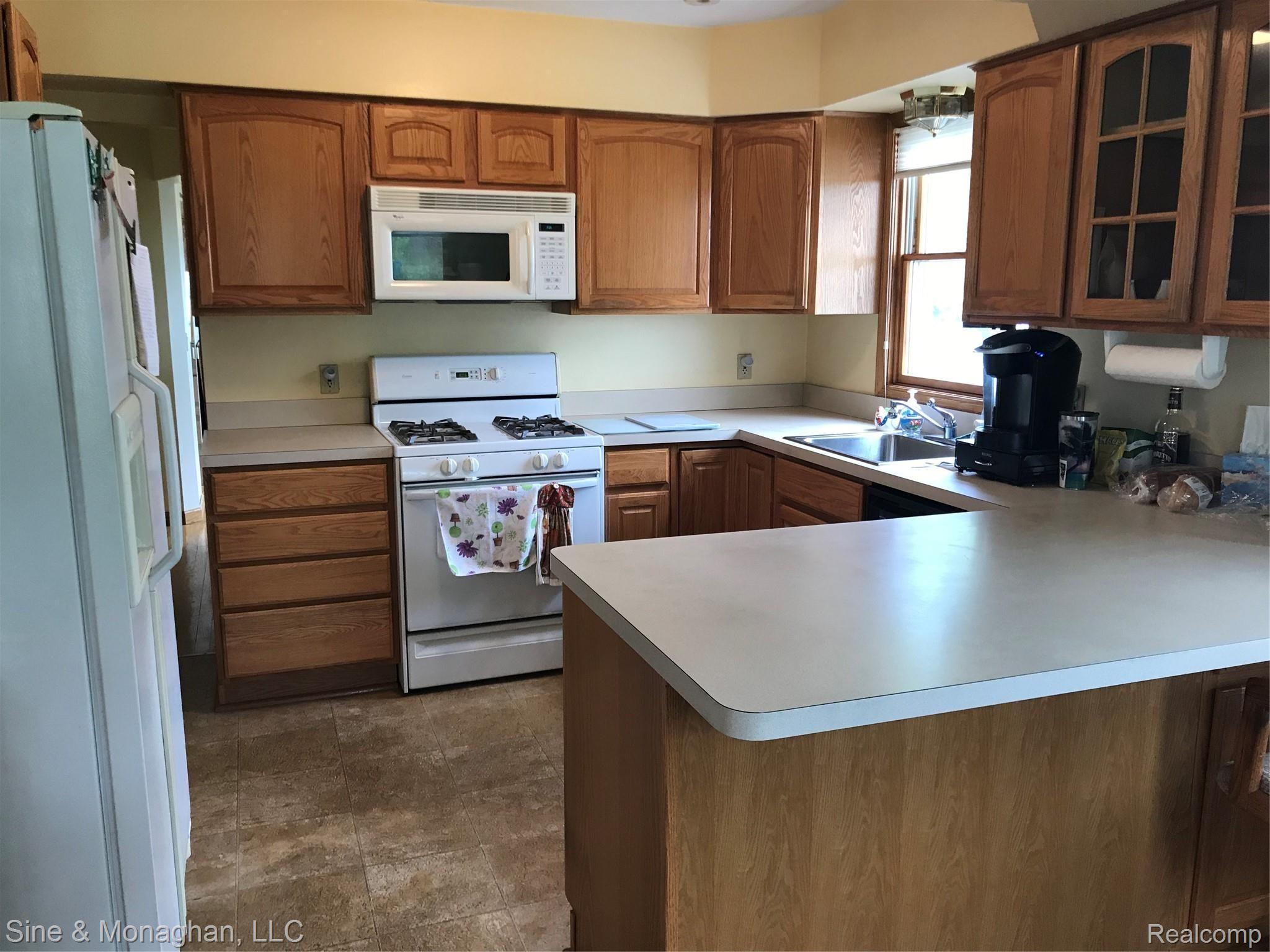 1447 River Road St. Clair, MI 48079 - Photo 5 of 64 5 KITCHEN W A VIEW 1447 RIVER RD.JPG