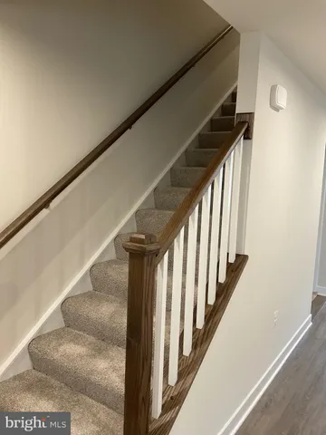 a view of a garage with an empty space