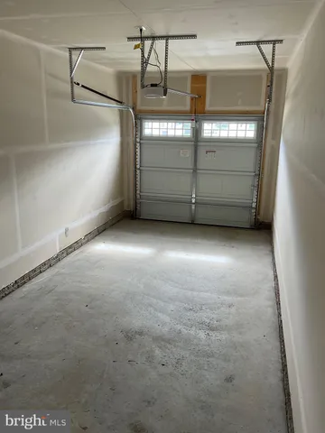 a view of a swimming pool with a backyard