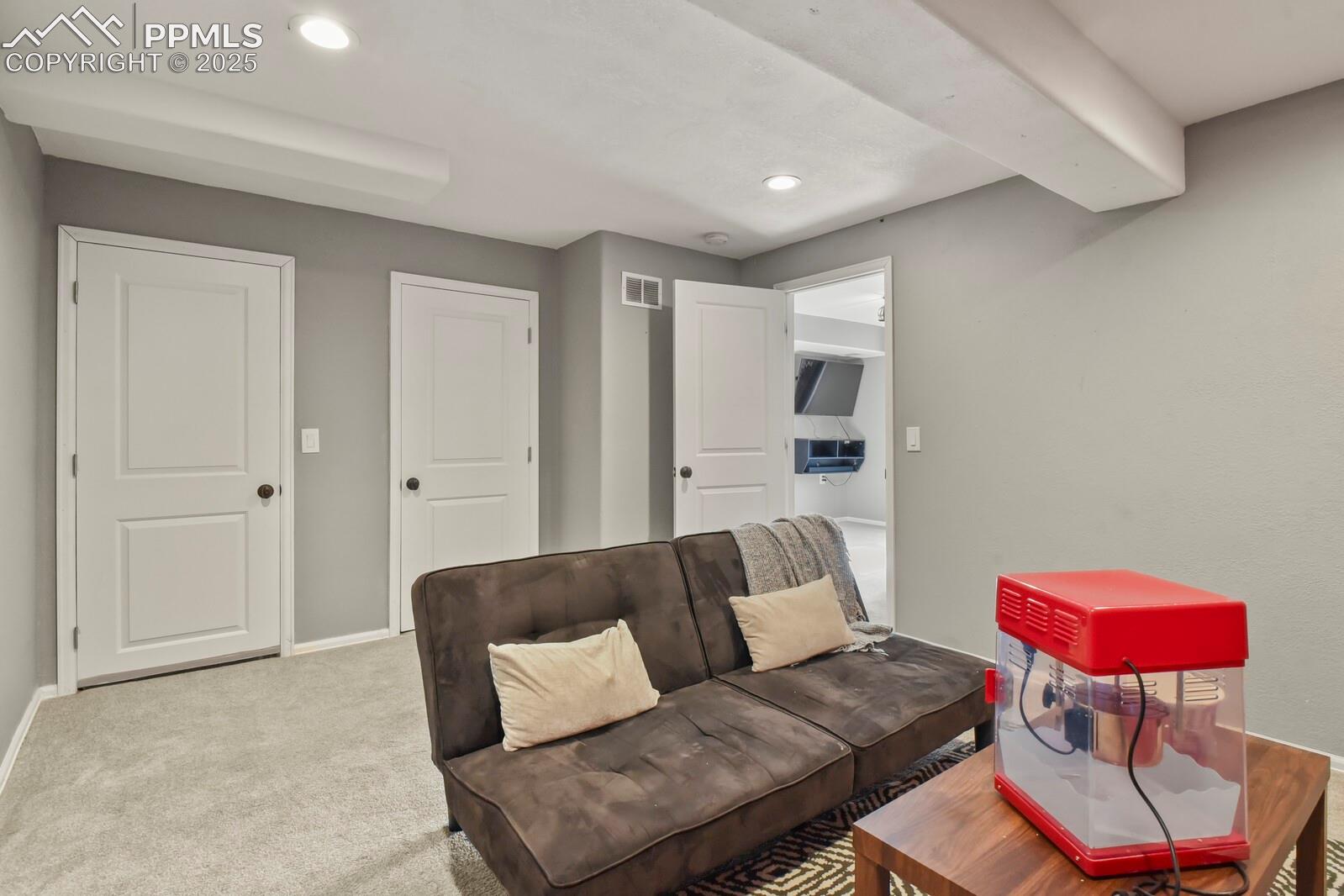 7660 Bullet Road Peyton, CO 80831 - Photo 32 of 50 Living area featuring recessed lighting and carpet floors