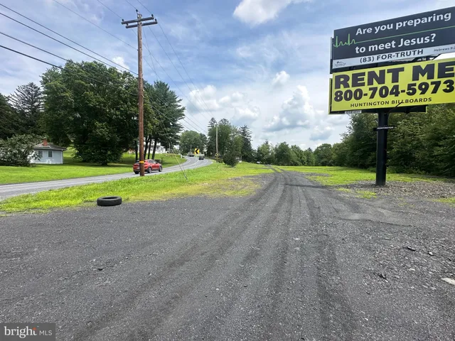 a view of a park with swings
