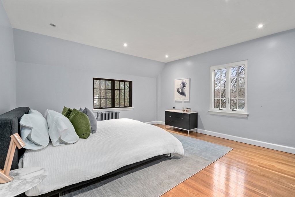 9 Penniman Road Brookline, MA 02445 - Photo 23 of 35 a bedroom with a bed and window