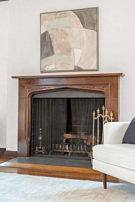 9 Penniman Road Brookline, MA 02445 - Photo 4 of 35 a living room with furniture and a fireplace