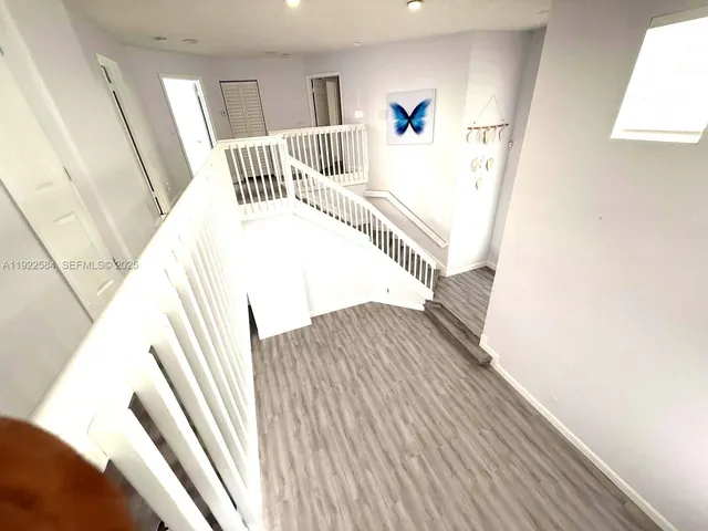 a view of a living room with furniture