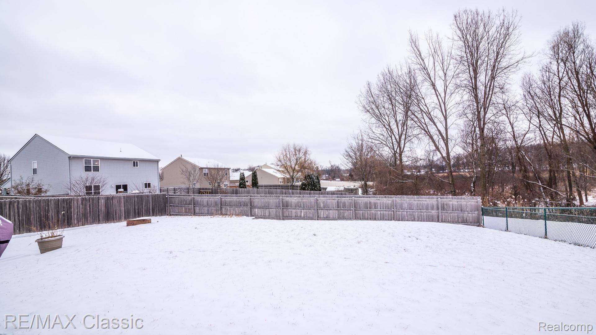 612 Rustic Trail Linden, MI 48451 - Photo 34 of 40 Large fenced back yard