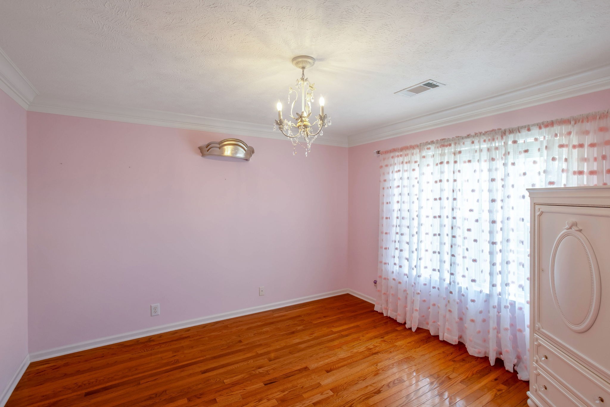 7344 Campton Road Nashville, TN 37211 - Photo 11 of 18 a view of empty room with wooden floor and fan