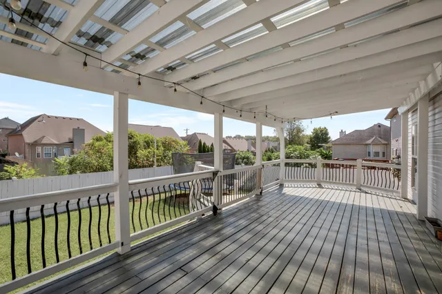 a view of a swimming pool with a lounge chair
