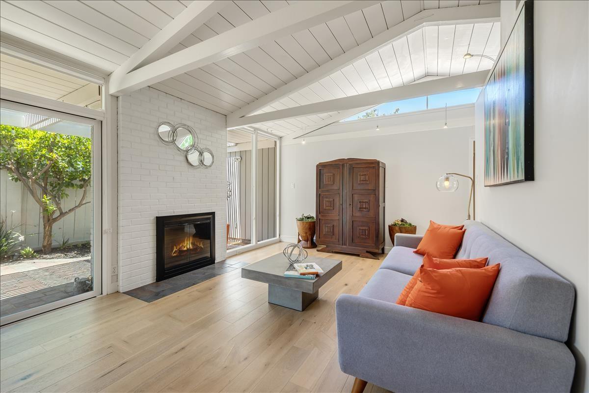 524 Thompson Avenue Mountain View, CA 94043 - Photo 13 of 34 a living room with furniture and a fireplace