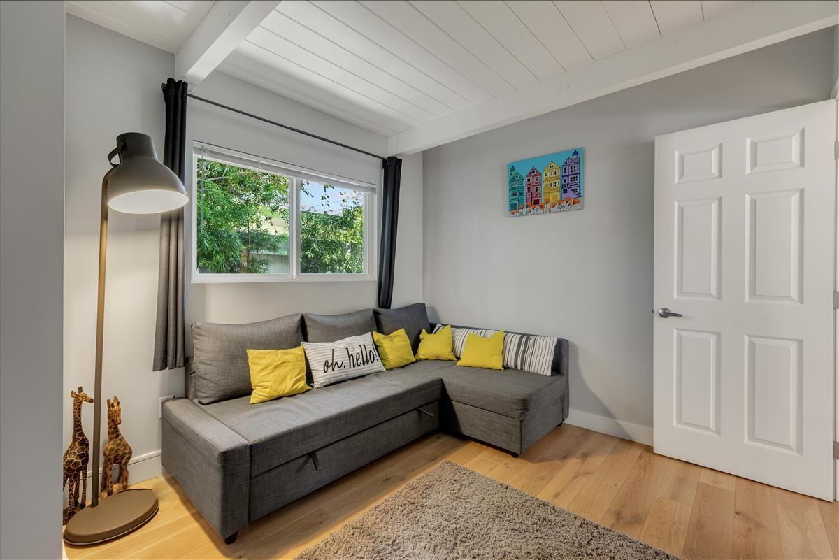524 Thompson Avenue Mountain View, CA 94043 - Photo 15 of 34 a living room with furniture and a large window