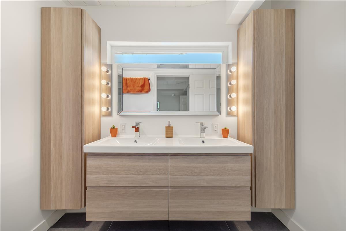 524 Thompson Avenue Mountain View, CA 94043 - Photo 19 of 34 a bathroom with a sink and a mirror