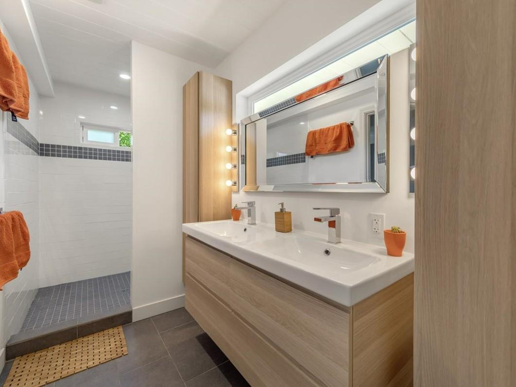 524 Thompson Avenue Mountain View, CA 94043 - Photo 20 of 34 a bathroom with a sink and a mirror