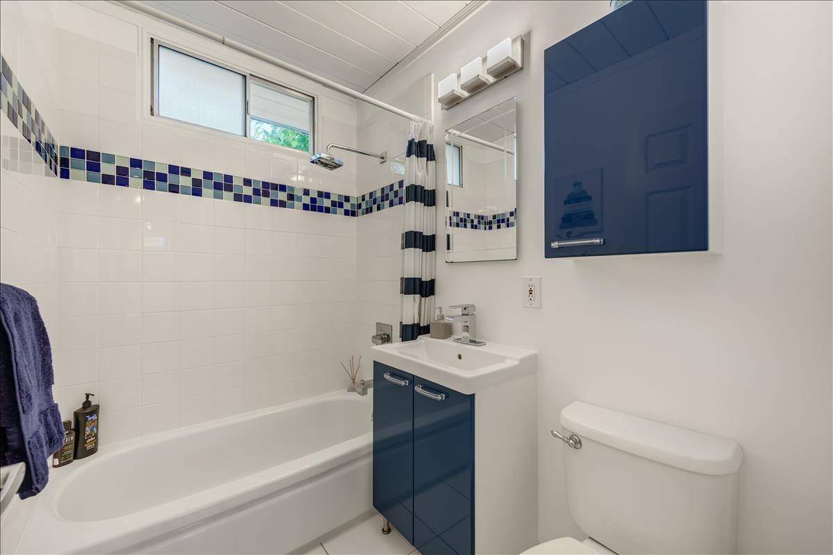 524 Thompson Avenue Mountain View, CA 94043 - Photo 24 of 34 a bathroom with a sink a toilet and shower