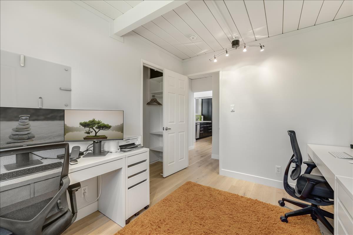 524 Thompson Avenue Mountain View, CA 94043 - Photo 26 of 34 a kitchen with white cabinets and sink