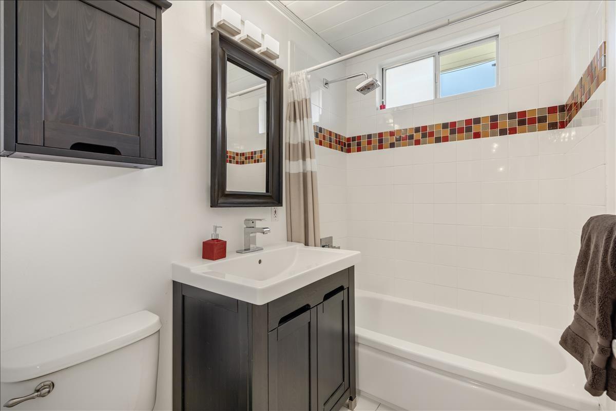 524 Thompson Avenue Mountain View, CA 94043 - Photo 29 of 34 a bathroom with a sink a toilet and a bathtub