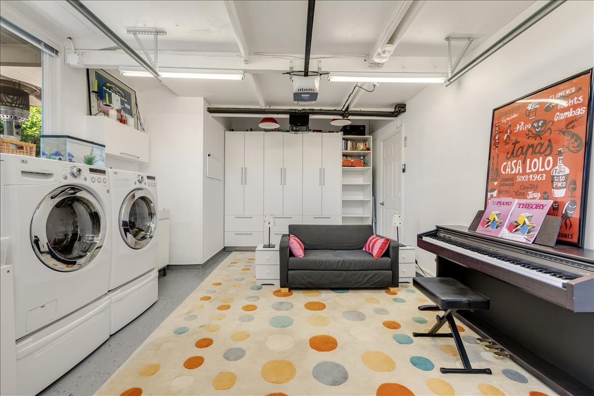524 Thompson Avenue Mountain View, CA 94043 - Photo 34 of 34 a living room with furniture and a flat screen tv