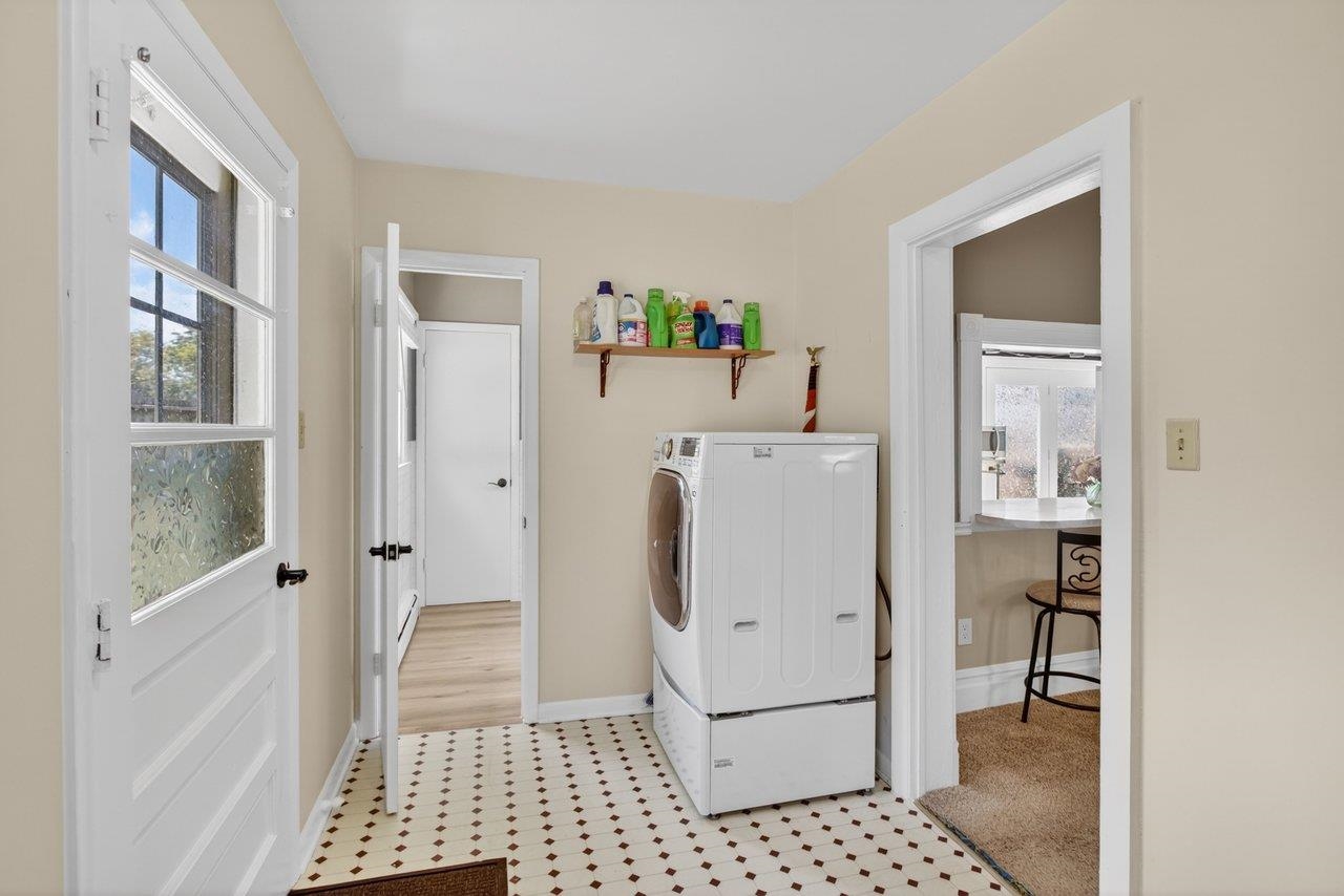 420 West Spring Street Woodstock, VA 22664 - Photo 28 of 67 a white refrigerator freezer and a stove sitting inside of a kitchen