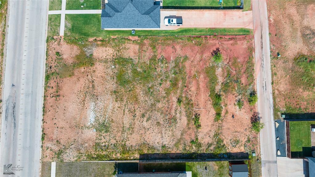 4102 Forrest Hill Road Abilene, TX 79606 - Photo 6 of 9 a view of a wooden door with a lake view