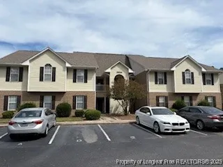 a car parked in front of a house