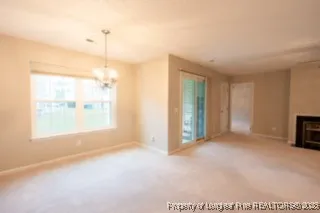 a view of a room with a large window