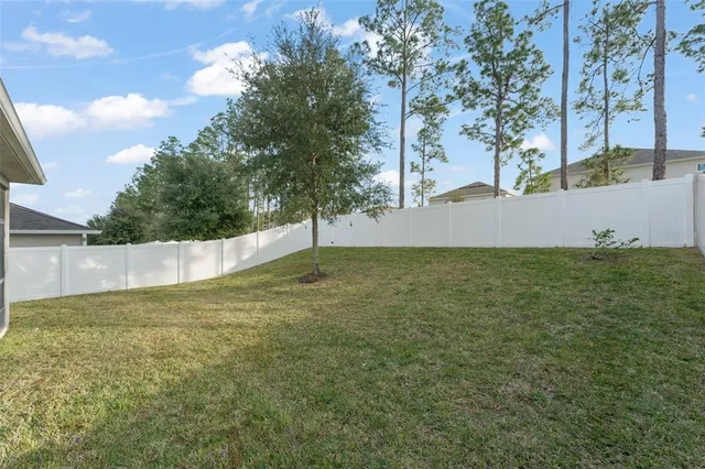 a view of a park with swings and slides