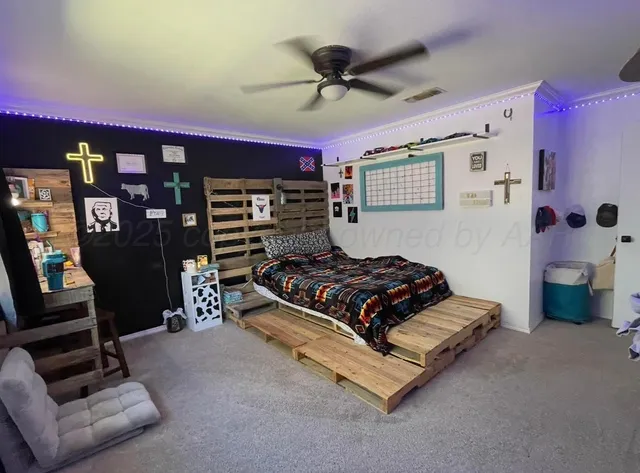 a bedroom with a bed and furniture