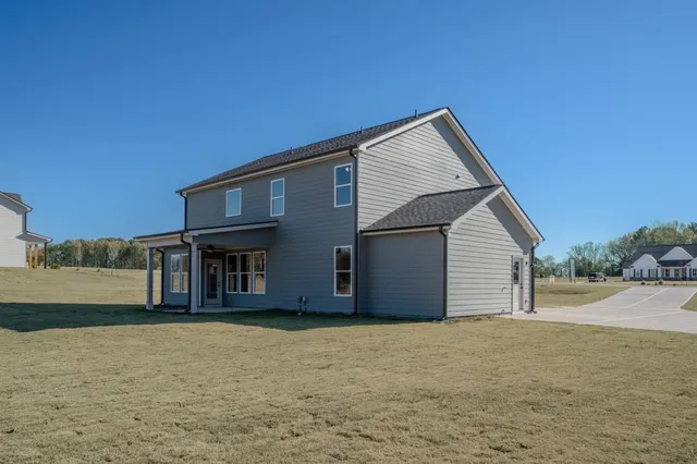 a view of a brick wall of building from a porch